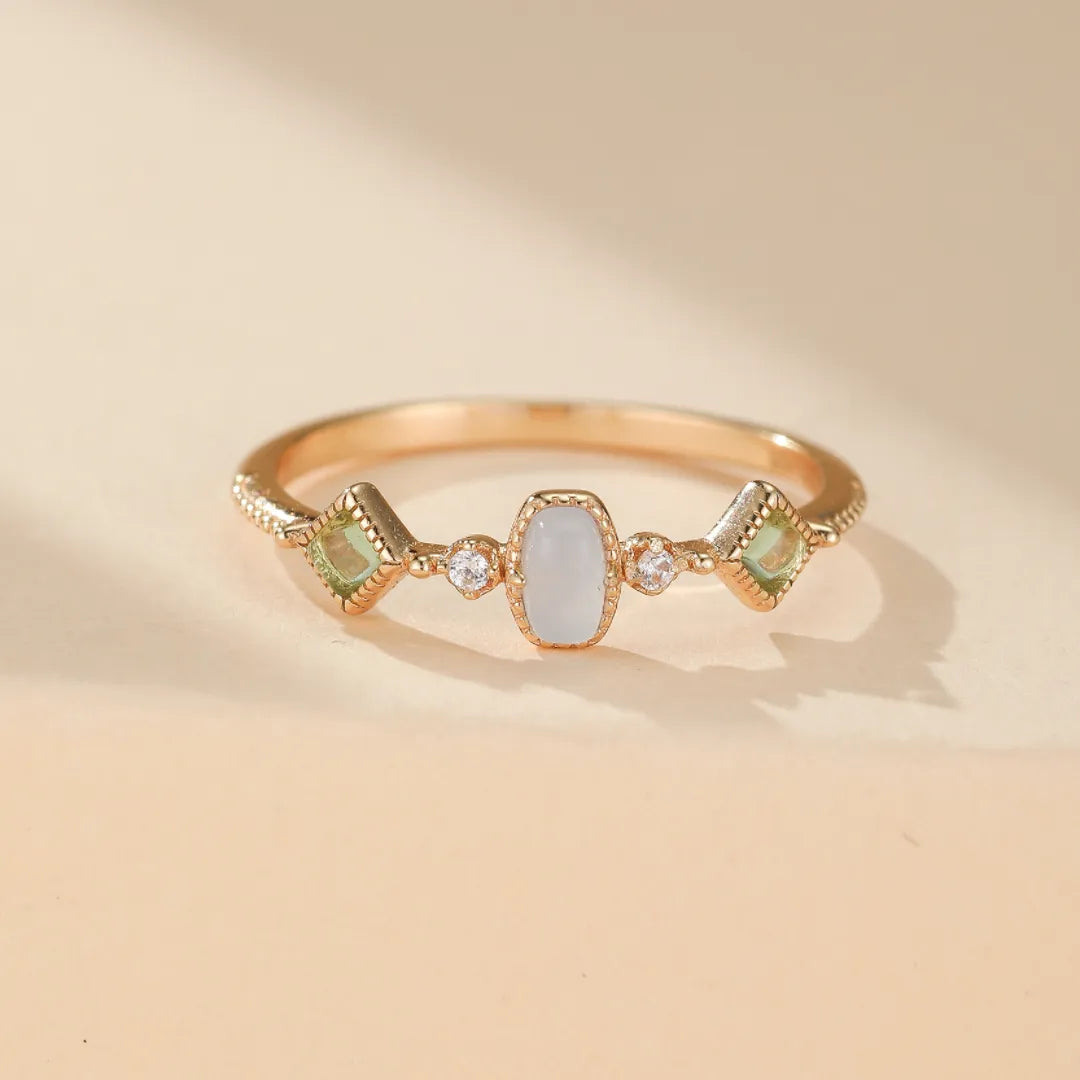 Anillo Aguamarina y Peridoto "Claridad" Plata Dorada