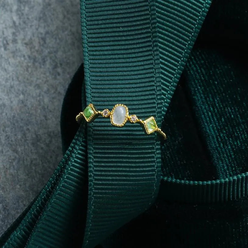 Anillo Aguamarina y Peridoto "Claridad" Plata Dorada