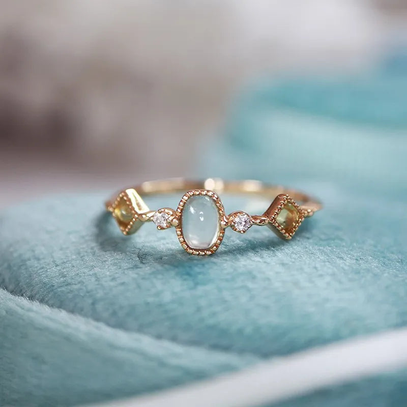 Anillo Aguamarina y Peridoto "Claridad" Plata Dorada