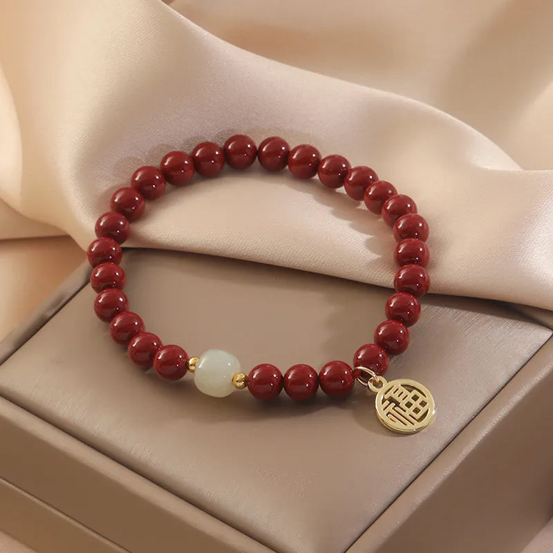 Bracelet Cinabre et Jade "Courage" Argent Doré Or