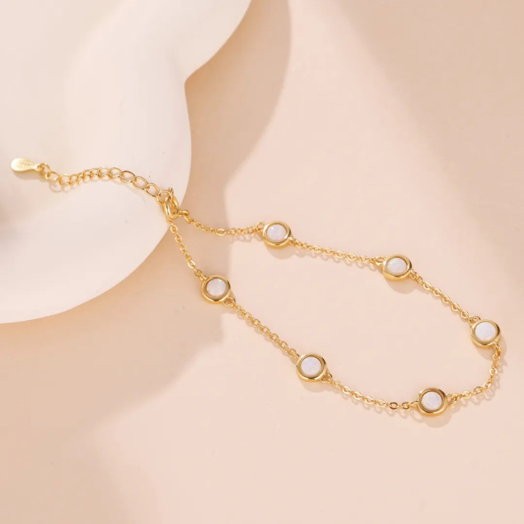 Pulsera Ópalo Blanco "Nieve Pura" Plata Dorada Oro