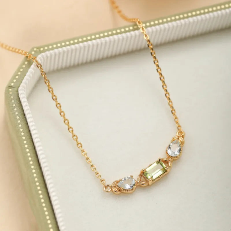 Collar Peridoto y Topacio "Refinamiento Geométrico" Plata Dorada