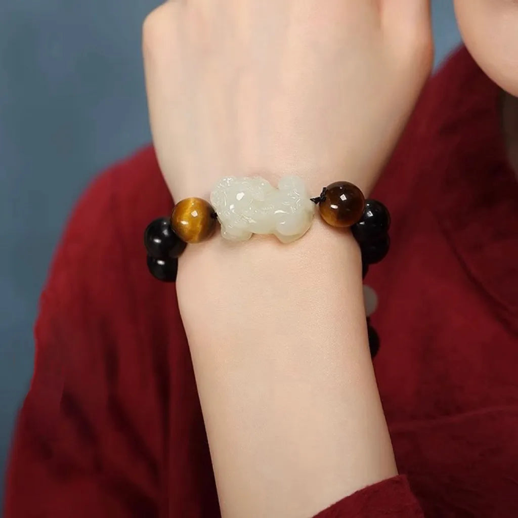 
Pulsera Pi Xiu Obsidiana y Jade "Escudo Energético"
