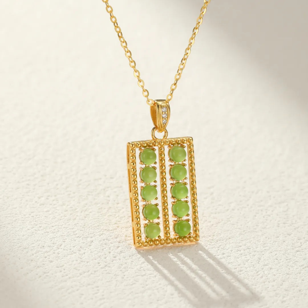 Jade Halskette "Ahnenweisheit" Gold Silber